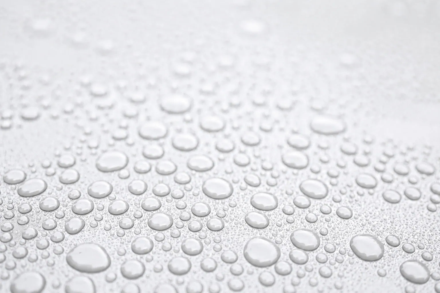 Water beading on white paint